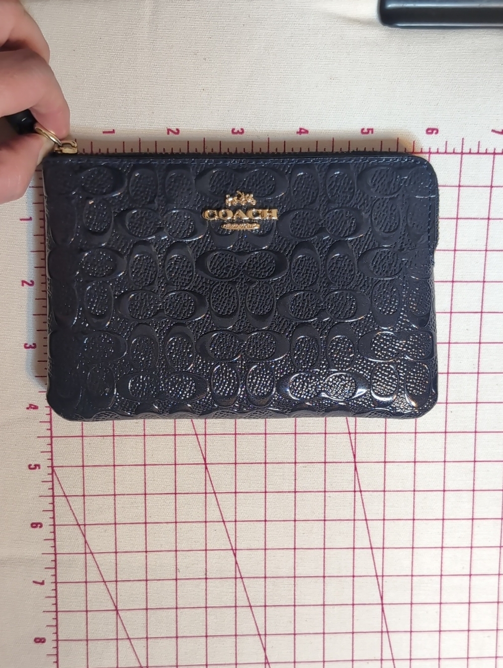 COACH Navy Blue Signature Embossed Leather Zip Wristlet with Gold Logo